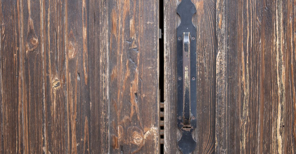 locksmith hands door — Trust Bolt Locksmith